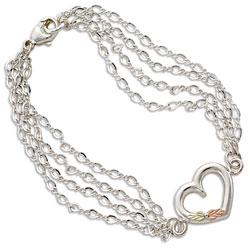 Landstrom's Black Hills Gold Bracelet. Beautiful Heart Design Sterling Silver Bracelet featuring 12K Gold Leaves. Landstrom's - The Original Black Hills Gold, Since 1878.