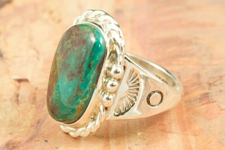 Genuine Crow Springs Turquoise set in Sterling Silver Ring. The Crow Springs Mine is located near Tonopah, Nevada. Created by Navajo Artist Tony Garcia. Signed by the artist.