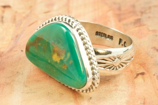 Genuine Crow Springs Turquoise set in Sterling Silver Ring. The Crow Springs Mine is located near Tonopah, Nevada. Created by Navajo Artist Freddy Charley. Signed by the artist.