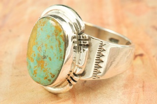Genuine Crow Springs Turquoise set in Sterling Silver Ring. The Crow Springs Mine is located near Tonopah, Nevada. Created by Navajo Artist John Nelson. Signed by the artist.