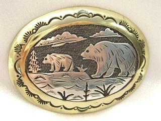 Authentic Native American Jewelry. Sterling Silver with Gold Fill Belt Buckle. Beautiful Bear Design. Created by Navajo Artist Tommy Singer.
