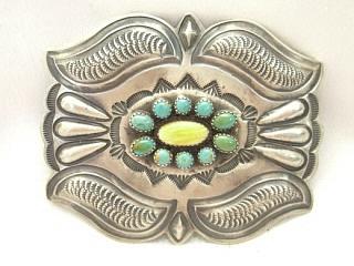 Authentic Native American Jewelry. Genuine Turquoise and Spiny Oyster Shell set in Sterling Silver Belt Buckle. Signed MC by the Navajo Artist.