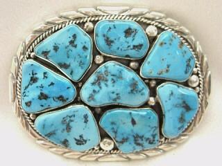 Authentic Native American Jewelry. 8 Beautiful Sleeping Beauty Turquoise Stones set in heavy gauge Sterling Silver. This Stunning Belt buckle was Created by Navajo Artist Marion Spencer.
