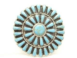 Genuine Turquoise set in Sterling Silver Brooch. This beautiful brooch can also be worn as a pendant. Signed LN by the Navajo Artist.