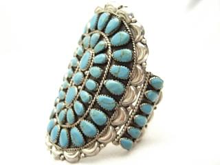 Genuine Sleeping Beauty Turquoise set in Sterling Silver Bracelet. Created by Zuni Artist Danny Wauneka . Signed DLW
