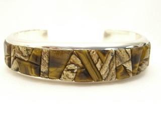 Genuine Picture Jasper, Tigers Eye and Wild Horse inlaid in Sterling Silver. Beautiful Heavy Gauge Sterling Silver Bracelet. Designed by Navajo Artist Calvin Begay. Signed.