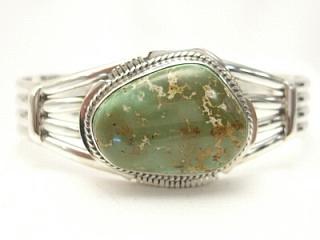 Genuine Pilot Mountain Turquoise set in Sterling Silver Bracelet. The Pilot Mountain Mine is located in Esmeralda County, Nevada. Created by Navajo Artist Kathy Yazzie.