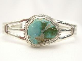 Genuine Pilot Mountain Turquoise set in Sterling Silver Bracelet. The Pilot Mountain Mine is located in Esmeralda County, Nevada. Created by Navajo Artist John Nelson.