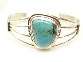 Genuine Manassa Turquoise set in Sterling Silver Bracelet. This Turquoise is also referred to as King�s Manassa Turquoise. The Manassa Turquoise mine is located in Manassa, Conejos County, Colorado. Created by Navajo Artist Margaret Platero.