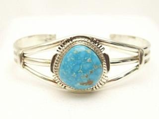 Genuine Blue Ridge Turquoise set in Sterling Silver Bracelet.  The Blue Ridge Turquoise Mine is located in Lander County County, Nevada. Created by Navajo Artist John Nelson. Signed.