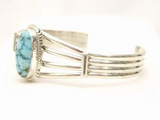 Genuine Dry Creek Turquoise set in Sterling Silver Bracelet. The Dry Creek Mine is located near Battle Mountain, Nevada. Dry Creek Turquoise forms when there are no heavy metals present such as copper or iron. To date, no other vein of this Turquoise has been discovered anywhere else other than the Dry Creek Mine and when this vein runs out, that will be the last of it. Because this Turquoise is as rare as the sacred buffalo, the Indians call it 