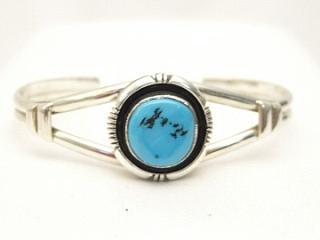 Genuine Sleeping Beauty Turquoise set in Sterling Silver Bracelet. The Sleeping Beauty Turquoise mine is located in Gila County, Arizona. Created by Navajo Artist Emerson Delgarito.