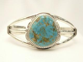 Genuine Crow Springs Turquoise set in Sterling Silver Bracelet. The Crow Springs Mine is located near Tonopah, Nevada. Created by Navajo Artist Margaret Platero.
