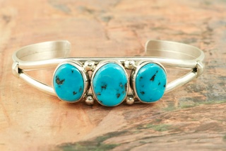 Genuine Sleeping Beauty Turquoise set in Sterling Silver Bracelet. The Sleeping Beauty Turquoise mine is located in Gila County, Arizona. Created by Navajo Artist Milton Lee. Signed by the artist.