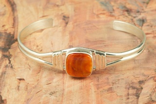 Sterling Silver Bear Design Bracelet. Beautiful overlay technique with heavy gauge Sterling Silver. Created by Navajo Artist Tommy Singer. Signed T. Singer.