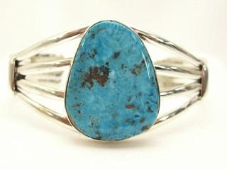 Genuine Candelaria Turquoise set in Sterling Silver Bracelet. The Candelaria mine is located in Esmeralda County, Nevada. Created by Navajo Artist Margaret Platero. Signed.