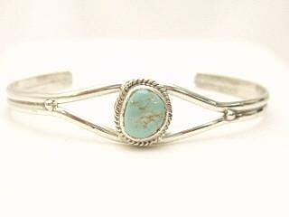 Genuine Dry Creek Turquoise set in Sterling Silver Bracelet. The Dry Creek Mine is located near Battle Mountain, Nevada. Dry Creek Turquoise forms when there are no heavy metals present such as copper or iron. To date, no other vein of this Turquoise has been discovered anywhere else other than the Dry Creek Mine and when this vein runs out, that will be the last of it. Because this Turquoise is as rare as the sacred buffalo, the Indians call it 