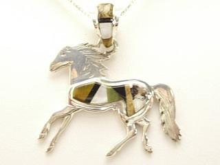 Genuine Turquoise inlaid between ribbons of Sterling Silver. Beautiful Jumping Horse Pendant Free 18