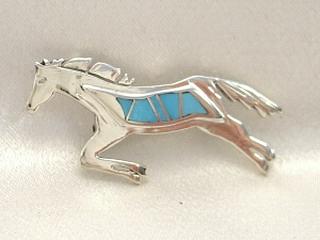 Genuine Turquoise inlaid between ribbons of Sterling Silver. Stunning Horse Brooch Created by Navajo Artist Calvin Begay. 