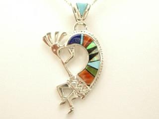 Genuine Sleeping Beauty Turquoise, Spiny Oyster Shell, Mohave Turquoise, and Blue Lapis inlaid in Sterling Silver. Beautiful Fire and Ice Lab Opal Accents. Precision inlay on the bale and the pendant. Free 18