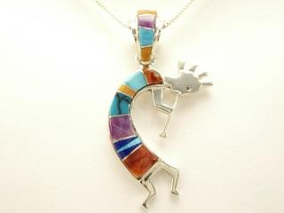 Genuine Turquoise, Spiny Oyster Shell, Sugilite and Blue Lapis inlaid between ribbons of Sterling Silver. Precision inlay on the Bale and Pendant. Free 18