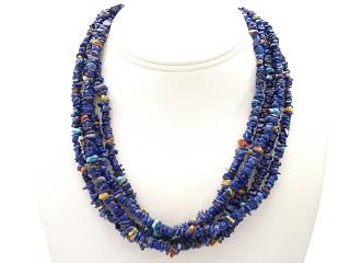 5 Strand Genuine Blue Lapis Necklace with Coral and Turquoise Accents. Sterling Silver Cones, Clasp and Extender. 
Created by Zuni Artist 
Susan Beal. 
