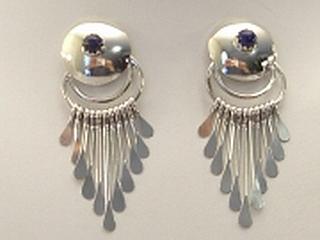 Genuine Blue Lapis set in Sterling Silver Post Earrings. 
Created by Navajo Artist 
Paula Armstrong. 
