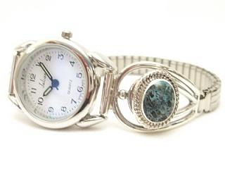 Genuine Sunnyside Turquoise set in Sterling Silver Watch tips. The matrix on this rare stone is outstanding. The Sunnyside mine is located in northern Nevada near the town of Tuscarora in the Tuscarora mountain range. The mine is no longer in operation as it has become part of a gold mining operation and a privately owned ranch. The Sunnyside mine was mined mostly in the 70's. You won't find much of this great turquoise around anymore except for old stashes. Created by Navajo Artist Berna Francsico. Signed.