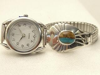 Genuine Boulder Turquoise set in Sterling Silver Watch Tips. The cabochon is Boulder Turquoise, you can see the veins of Turquoise running through the host rock. The Boulder Turquoise Mine is located in northeast Nevada. It was discovered in 1970 by a Shoshone sheep herder. Production is small due to the remote location and winter weather. Boulder Turquoise is valued for both it's beauty and rarity. Every stone is unique. Created by Navajo Artist Thomas Chischilly. The photo is of the watch you will be receiving.
