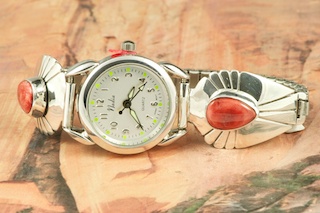 Genuine Copper Jasper set in Sterling Silver Watch Tips. Ladies quartz watch with expandable watch band. Created by Navajo Artist Larson Lee.
