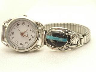 Genuine Sunnyside Turquoise set in Sterling Silver Watch Tips. The matrix on this rare stone is outstanding. The Sunnyside mine is located in northern Nevada near the town of Tuscarora in the Tuscarora mountain range. Created by Navajo Artist Freddy Charley. 