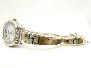 Stunning Watch Bracelet with Genuine Picture Jasper, Abalone Shell and Black Jade inlaid between ribbons of Sterling Silver. Designed by Navajo Artist Calvin Begay. Signed. 
