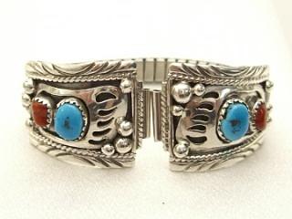 Authentic Native American Jewelry. Genuine Turquoise and Coral set in Sterling Silver Watch Tip. Beautiful Bear Paw Design with expandable band. Created by Navajo Artist Richard Hoskie. Signed R.