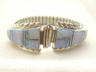 Fire & Ice Lab Opal inlaid between ribbons of Sterling Silver. Watch Tip with expandable band. Created by Navajo Artist Wallace Long. Signed L.