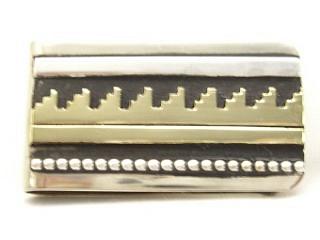 Genuine Turquoise, White Buffalo Turquoise and Black Jade inlaid between ribbons of Sterling Silver. Stunning Sterling Silver Money Clip. Created by Navajo Artist Calvin Begay.