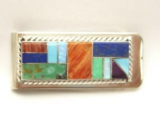 Authentic Native American Jewelry. Genuine Turquoise, Spiny Oyster Shell and Blue Lapis inlaid in Sterling Silver and set on a Nickel Silver Money Clip. Created by Navajo Artist Arnold Yazzie. Signed Y.