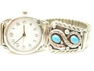 Genuine Sleeping Beauty Turquoise set in Sterling Silver Watch Tips. Sterling Silver Snake Design. Mens Watch with expandable band. Created by Navajo Artist Thomas Chischilly. Signed.