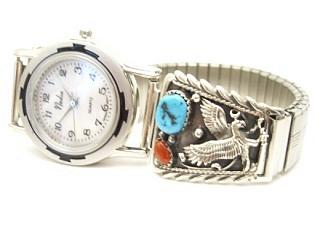 Genuine Sleeping Beauty Turquoise and Coral set in Sterling Silver.  Stunning Sterling Silver Eagle Design. Mens Watch with an expandable Band. Created by Navajo Artist Thomas Chischilly.