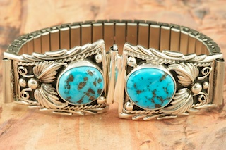 Genuine Sleeping Beauty Turquoise set in Sterling Silver. Mens Watch Tips with expandable band. Created by Navajo Artist Thomas Chischilly.