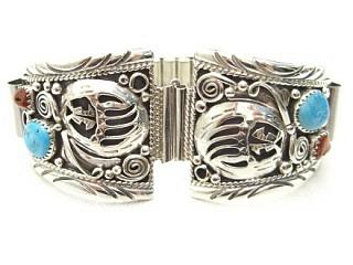 Genuine Turquoise and Coral set in Sterling Silver Watch Tip. Mens Watch Tip includes expandable band. Beautiful Bear Paw Design. Created by Navajo Artist Harry Spencer.