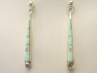 Fire & Ice Lab Opals inlaid between ribbons of Sterling Silver. Beautiful Sterling Silver Post Earrings feature precision channel inlay. Created by Navajo Artist Calvin Begay. 
