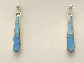 Fire & Ice Lab Opals inlaid between ribbons of Sterling Silver. Beautiful Sterling Silver Post Earrings feature precision channel inlay. Designed by Navajo Artist Calvin Begay. Signed.
