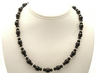 Genuine Black Onyx Necklace with Sterling Silver Beads
and Clasp. 
Navajo Made. 
