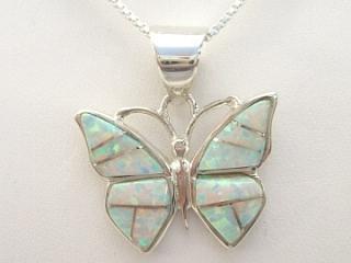 Authentic Native American Jewelry. Beautiful Fire & Ice Lab Opals inlaid between ribbons of Sterling Silver. Free 18