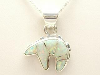 Stunning Fire and Ice Lab Opals inlaid between ribbons of Sterling Silver. Beautiful precision channel inlay. Free 18