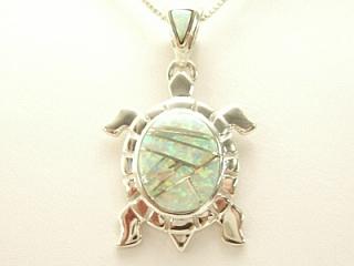 Beautiful Fire & Ice Lab Opals inlaid between ribbons of Sterling Silver. Turtle pendant features precision channel inlay on the bale and pendant. Free 18
