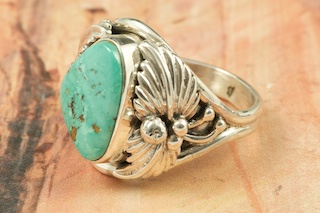 Genuine Pilot Mountain Turquoise set in Sterling Silver Ring. The Pilot Mountain Mine is located in Esmeralda County, Nevada. Created by Navajo Artist Bobby Piaso. Signed by the artist.
