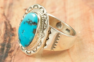 Genuine Sleeping Beauty Turquoise set in Sterling Silver Ring. The Sleeping Beauty Turquoise mine is located in Gila County, Arizona. Created by Navajo Artist Kathy Yazzie. Signed by the artist.