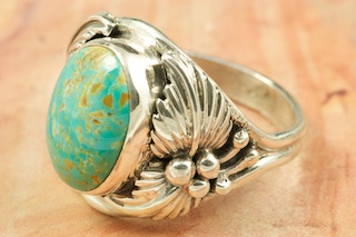 Genuine Pilot Mountain Turquoise set in Sterling Silver Ring. The Pilot Mountain Mine is located in Esmeralda County, Nevada. Created by Navajo Artist Bobby Piaso. Signed by the artist.