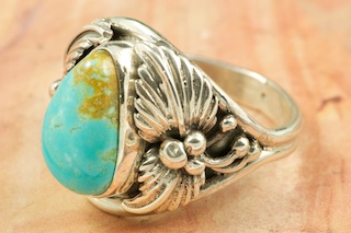 Genuine Pilot Mountain Turquoise set in Sterling Silver Ring. The Pilot Mountain Mine is located in Esmeralda County, Nevada. Created by Navajo Artist Bobby Piaso. Signed by the artist.